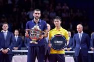 BASEL, SWITZERLAND - OCTOBER 30:  Marin Cilic of Croatia holds the trophy as he celebrates his victory next to runner up Kei Nishikori of Japan during the Swiss Indoors ATP 500 tennis tournament final match at St Jakobshalle on October 30, 2016 in Basel, Switzerland.  (Photo by Harold Cunningham/Getty Images)
